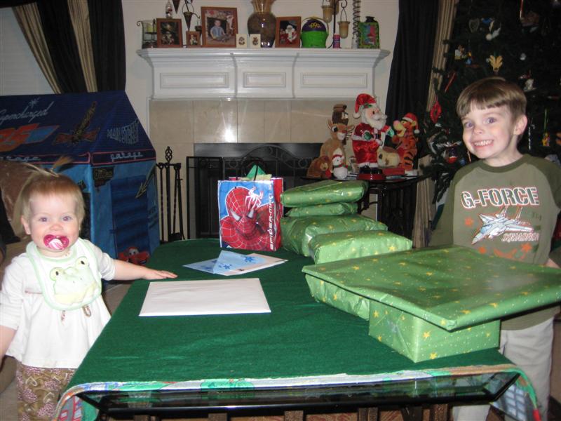 DaddysBirthday.JPG - Daddy turned like 100!  We're helping open his birthday gifts.