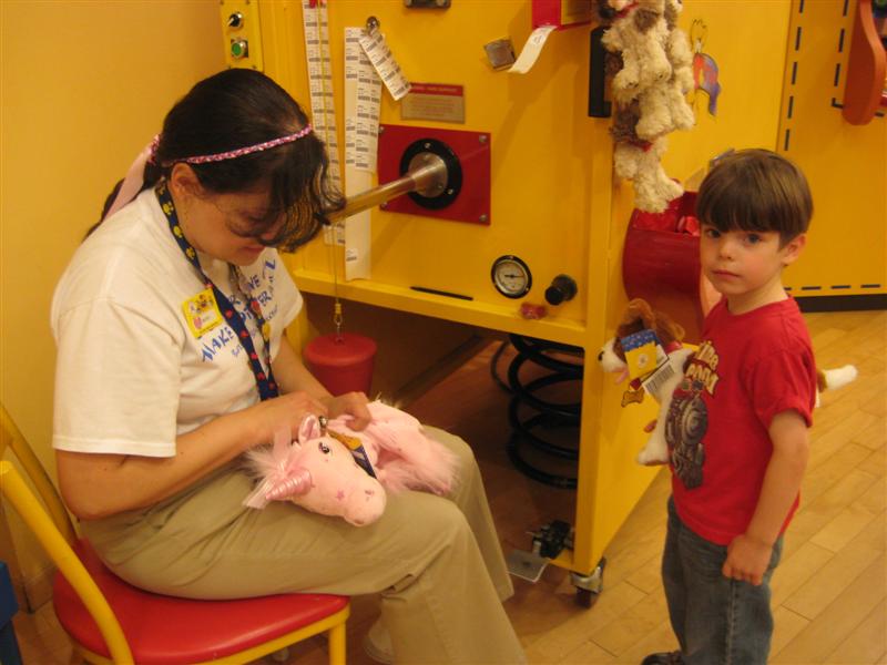 Jess_Build-A-Bear_K-9.JPG - That's MY Unicorn getting "stitched up"