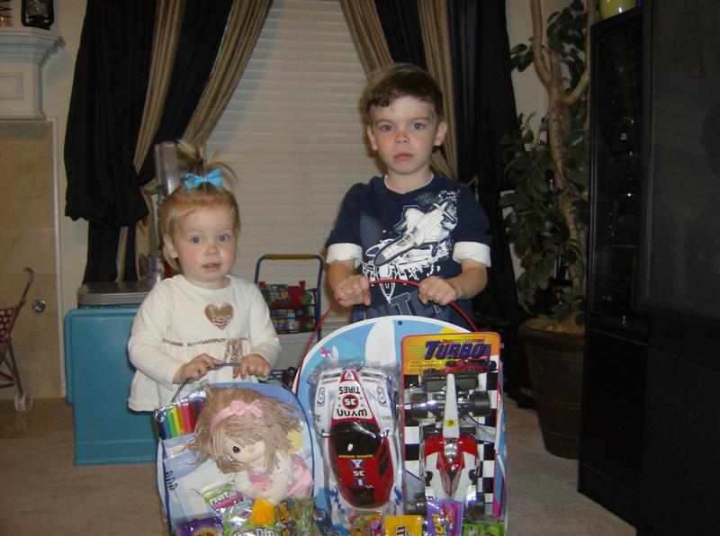 Jess_EasterBasketsWAlex.JPG - Easter baskets!  The bunny didn't do a good job hiding them!?...