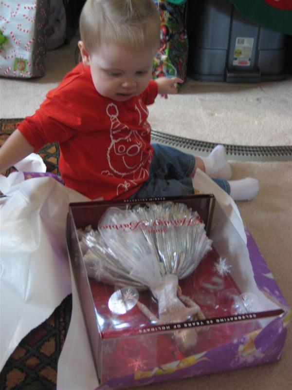 X-Mas2008-35.JPG - OK, cool.  This one's for me!... "What!?  What do you mean don't open it!  It's a collectible!"